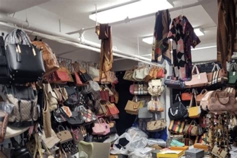 fake designer clothes nyc|counterfeit items arrested.